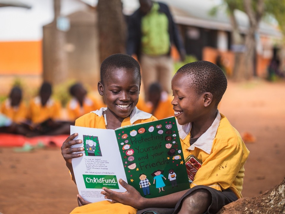 Children in our Education and Protection for Well-being program read our comic book on child protection.